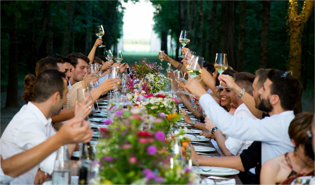 Guests Having a Toast at Wedding Dinner